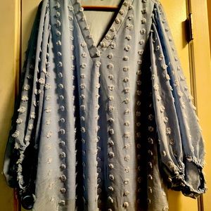 Like new, worn twice. Fits oversized so XL would fit as well